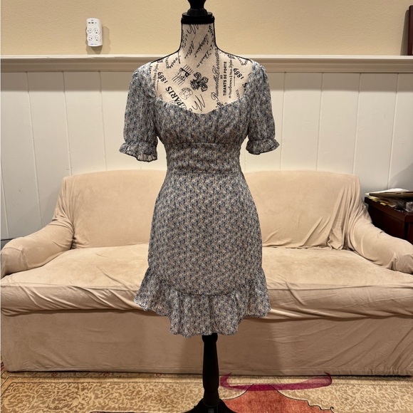 Storia Dresses & Skirts - NWT Light spring blue floral dress. Great for Spring Break or Graduation